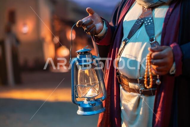 A traditional Saudi Arabian lantern glows in the night