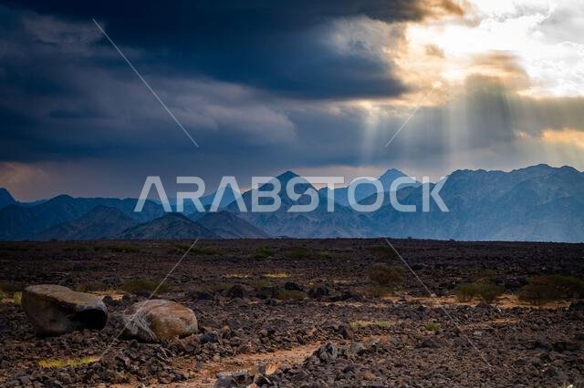 A beautiful landscape view of a Desert from Madinah Region, Saudi Arabia, in a cloudy evening A beautiful landscape view of a Desert from Madinah Region, Saudi Arabia, in a cloudy evening