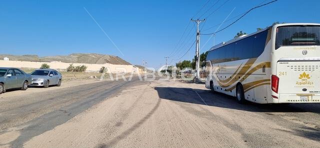 Mecca, Saudi Arabia - December 28th, 2022: View of the street in front of the Alamoudi Museum, Mecca, Saudi Arabia.