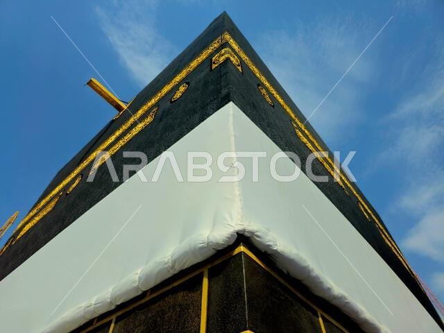 The Kaaba, stone building at the center of Islam's most important mosque and holiest sitein the grand mosque in Makkah, the direction of praying Qibla The Kaaba, stone building at the center of Islam's most important mosque and holiest sitein the grand mosque in Makkah, the direction of praying Qibla