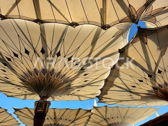 The tents at the prophet's mosque or Al Masjid Al Nabawi in Madinah at the outer courtyard to provide shade to pilgrims, a major site of pilgrimage, o