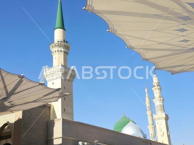 The exterior and the domes of The Prophet's Mosque or Al Masjid Al Nabawi, a major site of pilgrimage that falls under the purview of the Custodian of The exterior and the domes of The Prophet's Mosque or Al Masjid Al Nabawi, a major site of pilgrimage that falls under the purview of the Custodian of