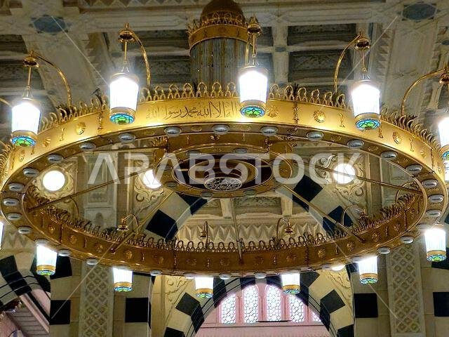 Translation of the Arabic Text (There is no God but Allah and Muhammad is his messenger), on the lights of The Prophet's Mosque al-Masjid al-Nabawi, t