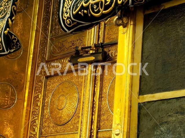 The Golden door of The Holy Kaaba in Ihram Kiswa or clothing, a white cloth symbolizing the Ihram is put on the Kabah building in pilgrimage in Hajj U