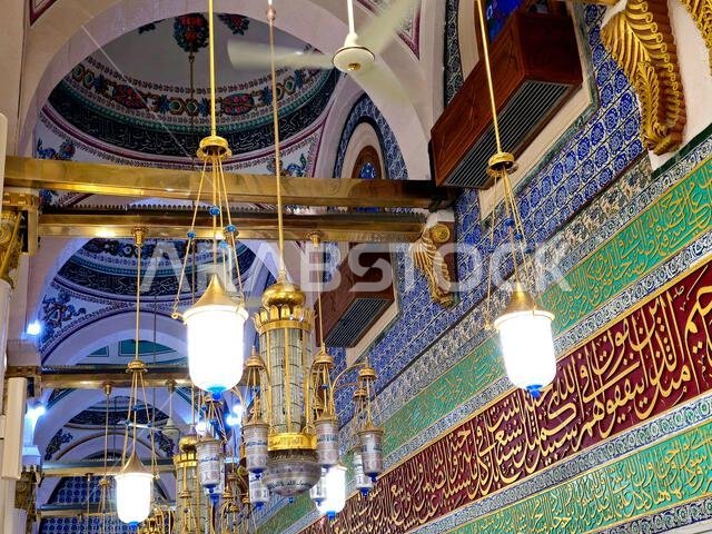 The walls inside the prophet mosque near Al Rawdah and the grave of the prophet Muhammad peace be upon him, Inside the prophet's mosque, with Arabic Q The walls inside the prophet mosque near Al Rawdah and the grave of the prophet Muhammad peace be upon him, Inside the prophet's mosque, with Arabic Q