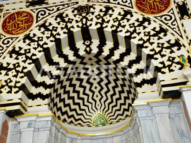 The Mihrab Niche in the prophet mosque near Al Rawdah and the grave of the prophet Muhammad peace be upon him, Inside the prophet's mosque, with Arabi