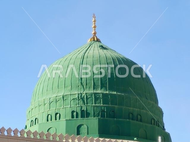 The Green dome of The Prophet's Mosque or Al Masjid Al Nabawi, a green-coloured dome built above the tombs of the Islamic prophet Muhammad and the 1st