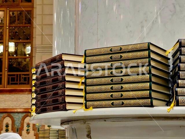 Translation of the Arabic text (Holy Noble Quran), Quran books inside The Prophet's Mosque al-Masjid al-Nabawi, the second mosque built by the Islamic