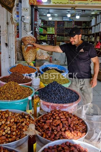 Saudi Arabia, Asir province, Abha, the souk, date seller