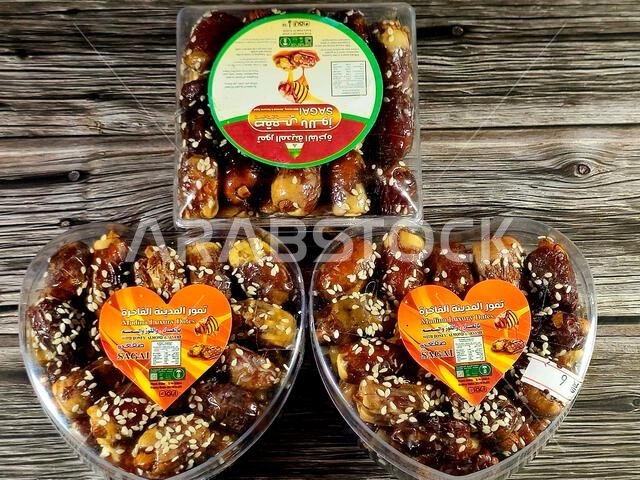 Cairo, Egypt, June 30 2024: Sagai Madina Luxury dates with honey almond and sesame, a cultivar of the palm date that is widely grown in Medina, Saudi Cairo, Egypt, June 30 2024: Sagai Madina Luxury dates with honey almond and sesame, a cultivar of the palm date that is widely grown in Medina, Saudi