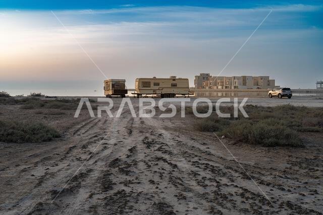 An abandoned camper trailer sits at the edge of the southeastern shore of the main island of Bahrain. Photo by Tuvyan Savuy/Scott Magkachi Saboy