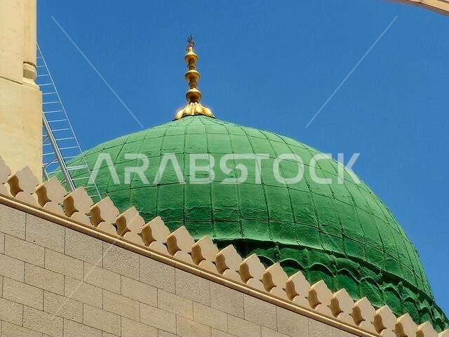 The exterior and the green dome of The Prophet's Mosque or Al Masjid Al Nabawi, a major site of pilgrimage that falls under the purview of the Custodi The exterior and the green dome of The Prophet's Mosque or Al Masjid Al Nabawi, a major site of pilgrimage that falls under the purview of the Custodi
