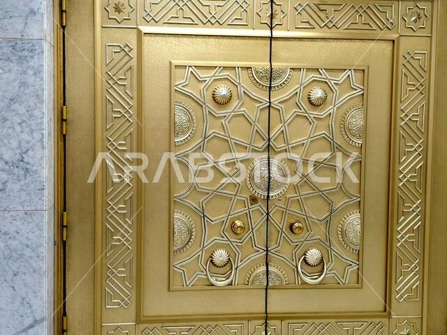 The golden door from the Sacred grand mosque of Makkah, the Sacred mosque is the most significant mosque in Islam, encloses vicinity of the Kaaba, amo