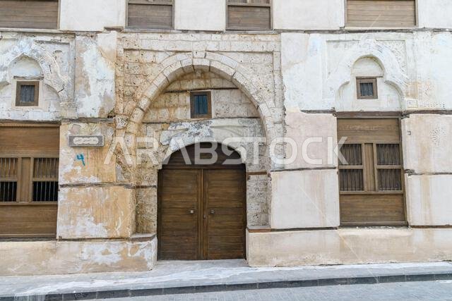 Jeddah, Saudi Arabia - December 21, 2022: Entrance of a historic Rubat Al-Khunji hospice in Al-Balad Old Town, providing shelter for women. Traditiona