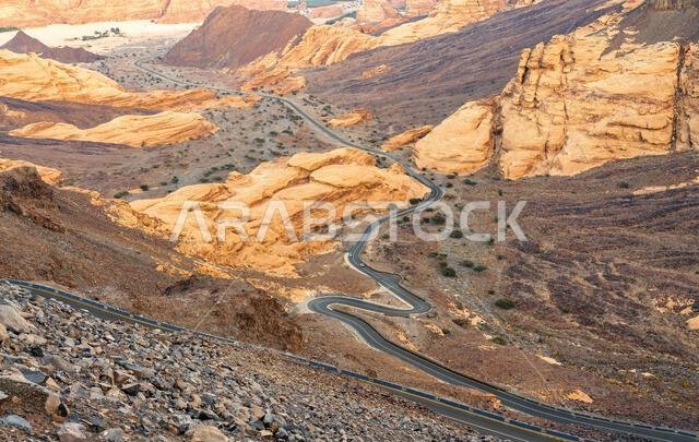 Scenic road to Harrat Viewpoint. A captivating journey towards  stunning sunset panorama of AlUla, Saudi Arabia.