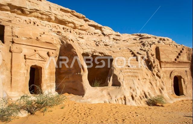 Alula, Saudi Arabia, April 4, 2024. The front view of the rock tomb at Hegra in a sunny day.