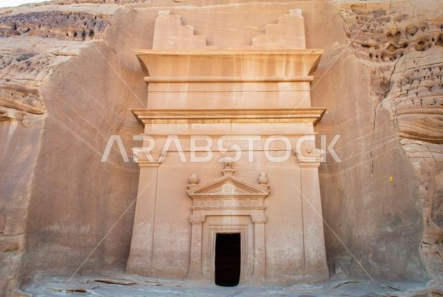 Alula, Saudi Arabia, April 4, 2024. The front view of the rock tomb at Hegra in a sunny day.