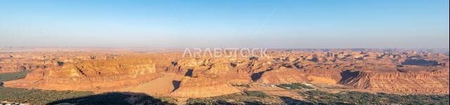 Harrat Viewpoint at Sunset, AlUla, Saudi Arabia. Breathtaking panorama over the rugged sandstone formations and desert landscape of this stunning regi