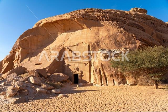 Jabal AlBanat, a sandstone mountain with the ancient ruins of the tombs of Qasr Al-Bint in Hegra, AlUla, archaeological wonders in Saudi Arabia Jabal AlBanat, a sandstone mountain with the ancient ruins of the tombs of Qasr Al-Bint in Hegra, AlUla, archaeological wonders in Saudi Arabia