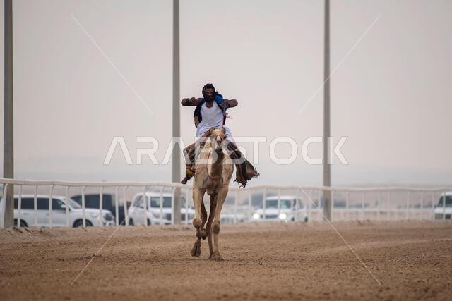 سباق الجمال التقليدي في الشحانية بقطر، حيث يتم استخدام الروبوتات بدلاً من الفارس. سباق الجمال التقليدي في الشحانية بقطر، حيث يتم استخدام الروبوتات بدلاً من الفارس.