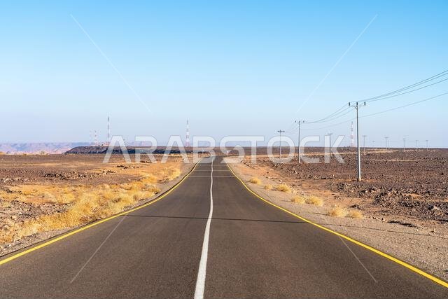 Scenic road to Harrat Viewpoint. A captivating journey towards  stunning sunset panorama of AlUla, Saudi Arabia.