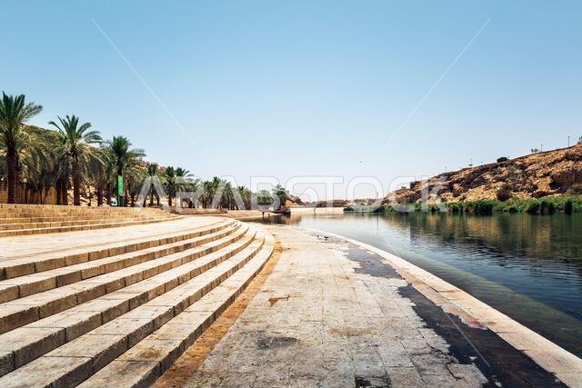 Wadi Namar Dam in Riyadh, Saudi Arabia, offers a picturesque daytime view, with calm waters and scenic hills bathed in sunlight. Wadi Namar Dam in Riyadh, Saudi Arabia, offers a picturesque daytime view, with calm waters and scenic hills bathed in sunlight.