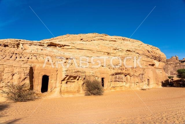 Jabal AlBanat, a sandstone mountain with the ancient ruins of the tombs of Qasr Al-Bint in Hegra, AlUla, archaeological wonders in Saudi Arabia