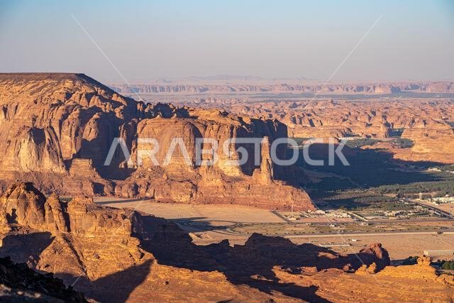 Harrat Viewpoint at Sunset, AlUla, Saudi Arabia. Breathtaking panorama over the rugged sandstone formations and desert landscape of this stunning regi