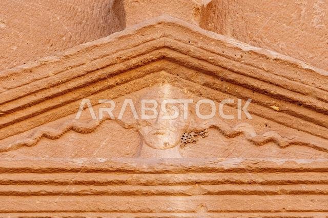 Jabal AlBanat, a sandstone mountain with the ancient ruins of the tombs of Qasr Al-Bint in Hegra, AlUla, archaeological wonders in Saudi Arabia