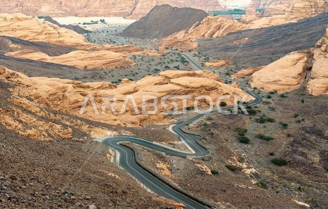 Scenic road to Harrat Viewpoint. A captivating journey towards  stunning sunset panorama of AlUla, Saudi Arabia.