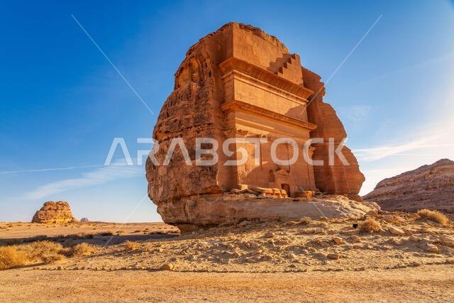 The Tomb of the Lion of Kuza at sunset, Nabataean carved sandstone monument in the ancient city of Hegra, archaeological wonder in AlUla, Saudi Arabia
