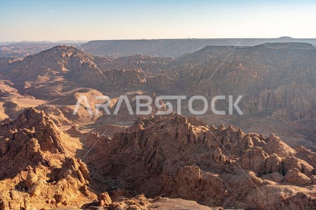 Harrat Viewpoint at Sunset, AlUla, Saudi Arabia. Breathtaking panorama over the rugged sandstone formations and desert landscape of this stunning regi