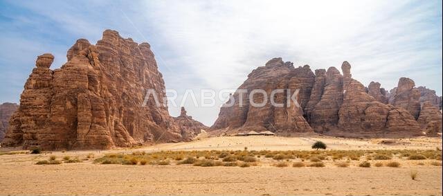 Sandstone formations of Ashar Valley provide a breathtaking backdrop for the luxurious resorts within amazing desert landscape of AlUla, Saudi Arabia