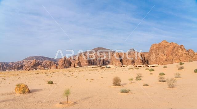 Sandstone formations of Ashar Valley provide a breathtaking backdrop for the luxurious resorts within amazing desert landscape of AlUla, Saudi Arabia Sandstone formations of Ashar Valley provide a breathtaking backdrop for the luxurious resorts within amazing desert landscape of AlUla, Saudi Arabia