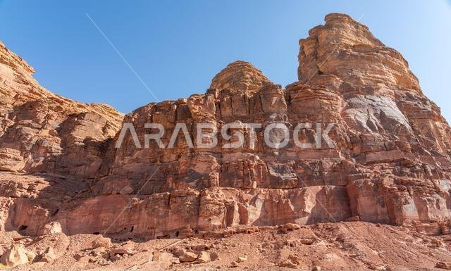 The amazing ancient ruins of the tombs carved in the rock in Dadan archaeological site, heritage of a historical lost civilization, AlUla, Saudi Arab The amazing ancient ruins of the tombs carved in the rock in Dadan archaeological site, heritage of a historical lost civilization, AlUla, Saudi Arab