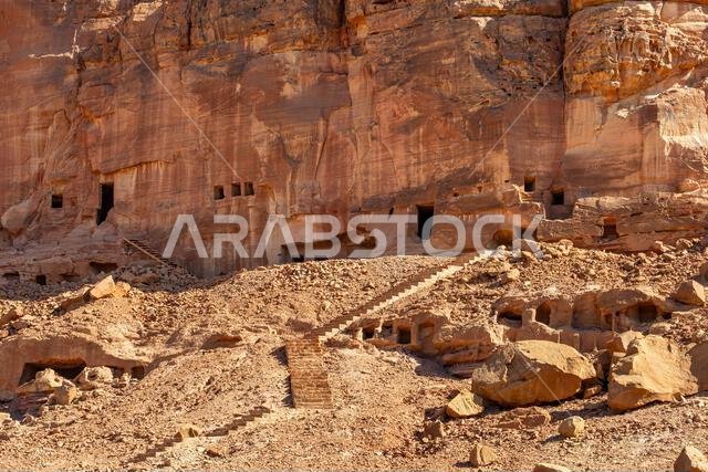 The amazing ancient ruins of tombs carved in the rock in Dadan archaeological site,  heritage of historical lost civilization, in AlUla, Saudi Arabia