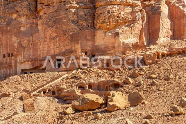 The amazing ancient ruins of tombs carved in the rock in Dadan archaeological site, heritage of historical lost civilization, in AlUla, Saudi Arabia The amazing ancient ruins of tombs carved in the rock in Dadan archaeological site, heritage of historical lost civilization, in AlUla, Saudi Arabia