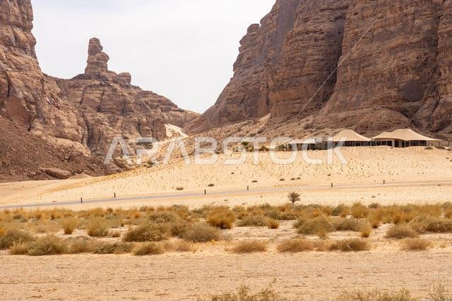Sandstone formations of Ashar Valley provide a breathtaking backdrop for the luxurious resorts within amazing desert landscape of AlUla, Saudi Arabia Sandstone formations of Ashar Valley provide a breathtaking backdrop for the luxurious resorts within amazing desert landscape of AlUla, Saudi Arabia