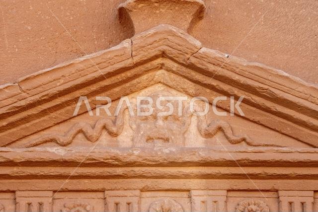 Jabal AlBanat, a sandstone mountain with the ancient ruins of the tombs of Qasr Al-Bint in Hegra, AlUla, archaeological wonders in Saudi Arabia