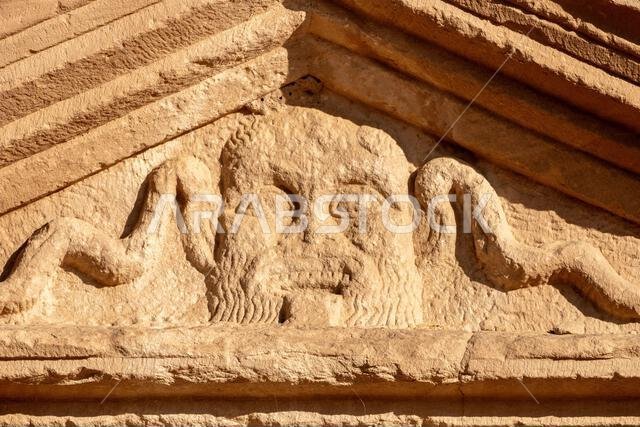 Jabal AlBanat, a sandstone mountain with the ancient ruins of the tombs of Qasr Al-Bint in Hegra, AlUla, archaeological wonders in Saudi Arabia
