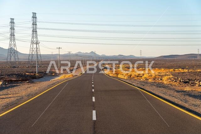 Scenic road to Harrat Viewpoint. A captivating journey towards  stunning sunset panorama of AlUla, Saudi Arabia.