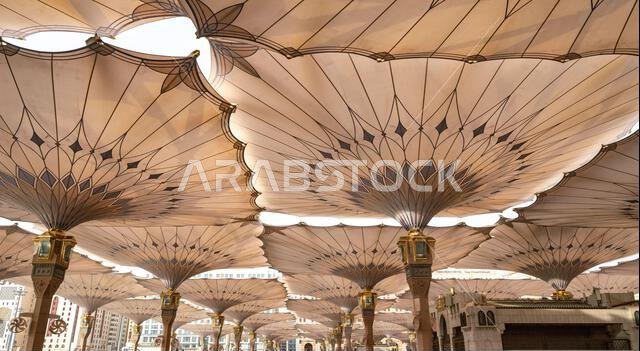 Giant umbrellas of the grand King Abdullah Expansion of the Prophets Mosque in Medina, second holiest site of Islam in Saudi Arabia Giant umbrellas of the grand King Abdullah Expansion of the Prophets Mosque in Medina, second holiest site of Islam in Saudi Arabia