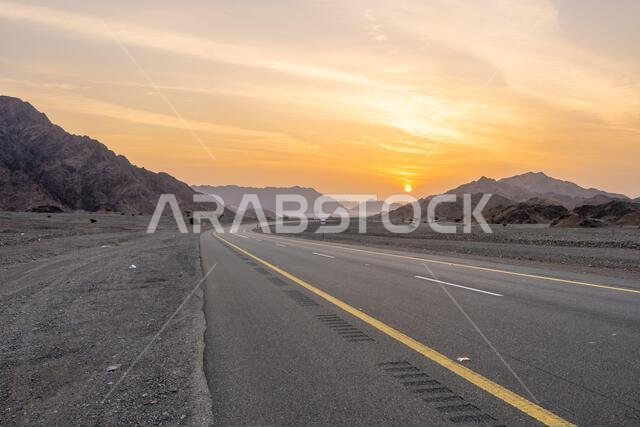 The scenic desert route from AlUla to Medina at sunrise, breathtaking panorama of Saudi Arabia with amazing sandstone rock formations