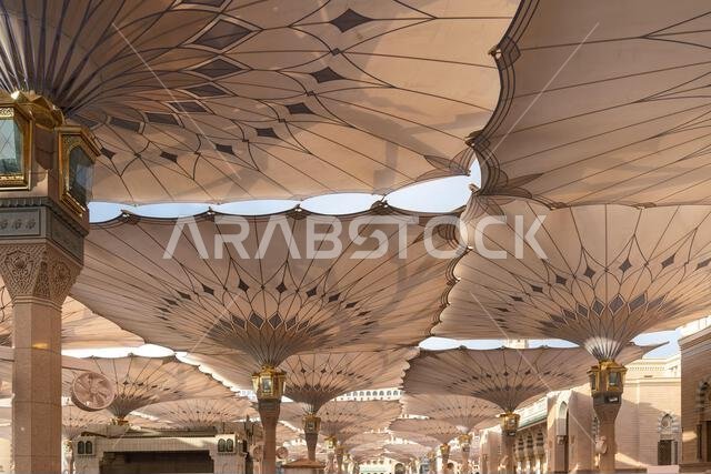 Giant umbrellas of the grand King Abdullah Expansion of the Prophets Mosque in Medina, second holiest site of Islam in Saudi Arabia