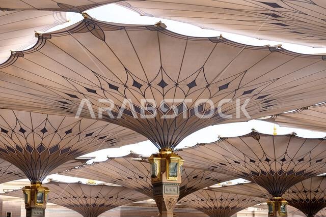 Giant umbrellas of the grand King Abdullah Expansion of the Prophets Mosque in Medina, second holiest site of Islam in Saudi Arabia Giant umbrellas of the grand King Abdullah Expansion of the Prophets Mosque in Medina, second holiest site of Islam in Saudi Arabia