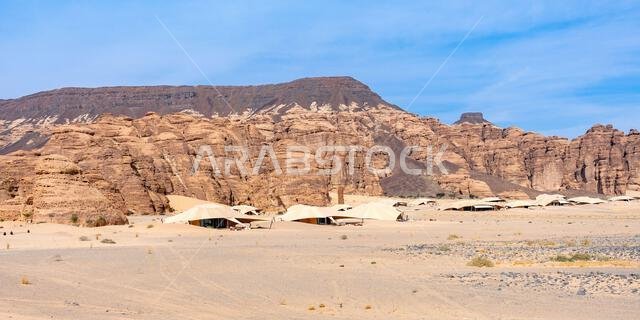 Sandstone formations of Ashar Valley provide a breathtaking backdrop for the luxurious resorts within amazing desert landscape of AlUla, Saudi Arabia Sandstone formations of Ashar Valley provide a breathtaking backdrop for the luxurious resorts within amazing desert landscape of AlUla, Saudi Arabia