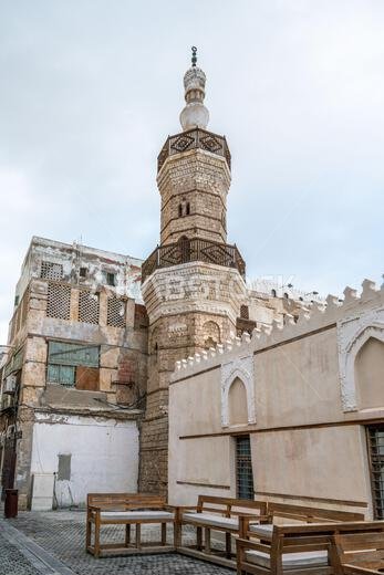 Historic Al Balad district of Jeddah, Saudi Arabia, slumbers on a tranquil Sunday morning, the old Al Shafee Mosque keeping vigil over the quiet Historic Al Balad district of Jeddah, Saudi Arabia, slumbers on a tranquil Sunday morning, the old Al Shafee Mosque keeping vigil over the quiet