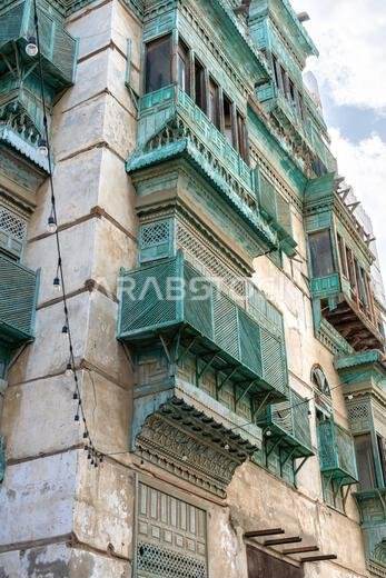 Architectural gems of Al Balad, historic heart of Jeddah, Saudi Arabia, stand serene and weathered, preserving  rich cultural heritage of the city