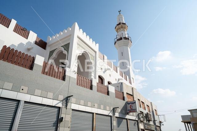 Historic Al Balad district of Jeddah, Saudi Arabia, rests peacefully on a Sunday morning, King Abdulaziz Grand Mosque standing watch over the quiet