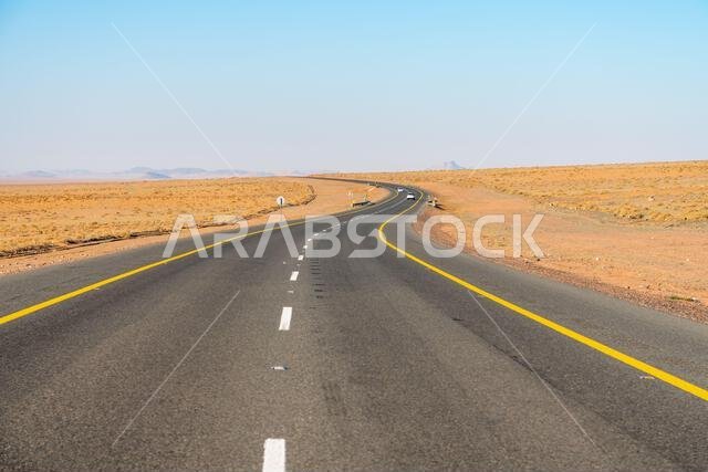 Desert of Saudi Arabia - December 15, 2024: scenic road from Riyadh to AlUla, through a landscape of sand desert, rock formations and mountains